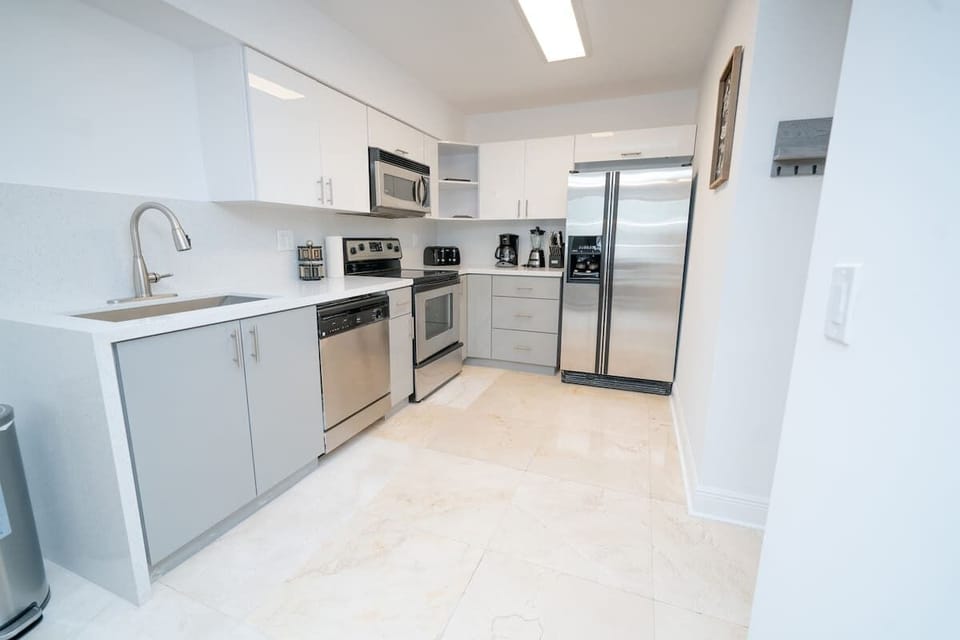 Fully equipped kitchen with complete set of cookware