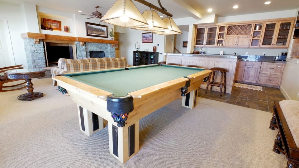 Downstairs Game/Gathering/Entertainment Room. Extra card table to play the many board games included