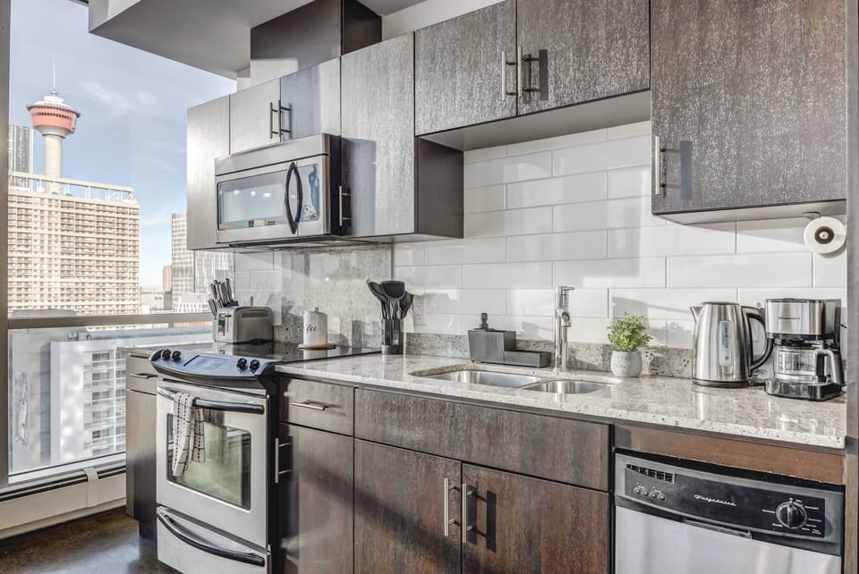 Fully equipped kitchen with silver appliances