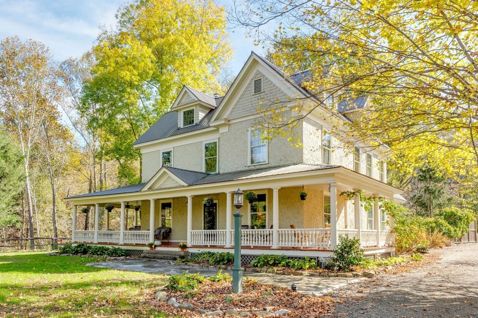 This Farmhouse beauty is located on several acres along Spring Creek 