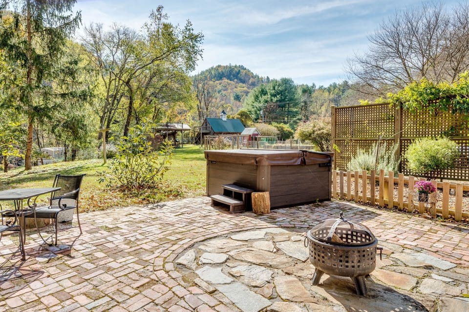 Six person Hot Tub out the back door for your pleasure, next to firepit & garden