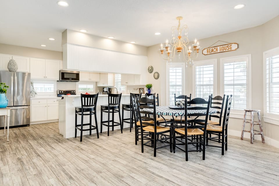 Nearby breakfast bar offers seating for 4