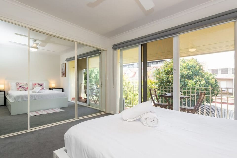 This gorgeous bedroom has its own private balcony/ patio. Grab a coffee in the morning while everyone else is still sleeping and sit on the balcony enjoying the refreshing Melbourne air.