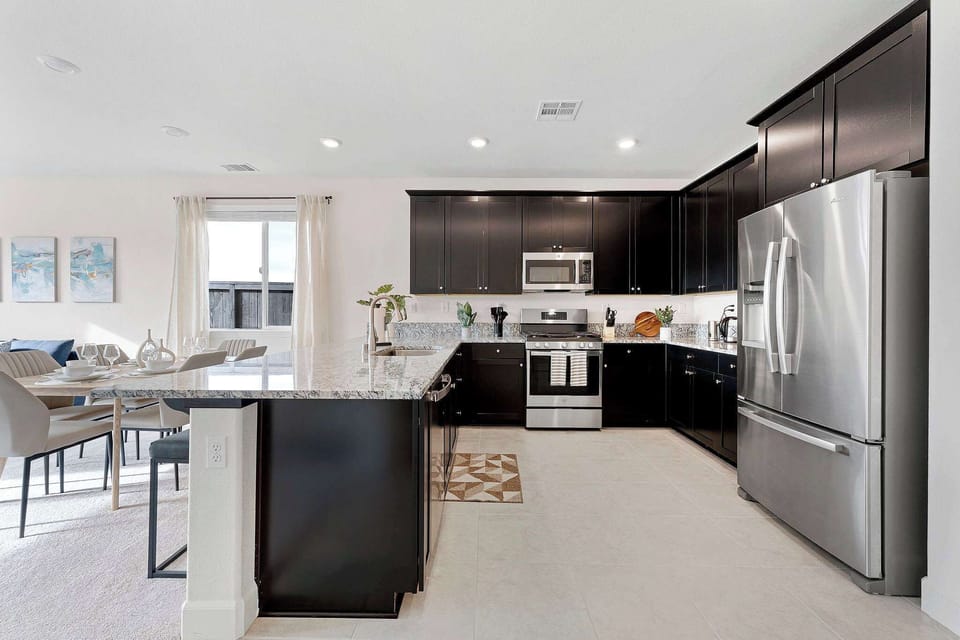 A stainless steel stove, microwave, and refrigerator for you to feel like you're right at home