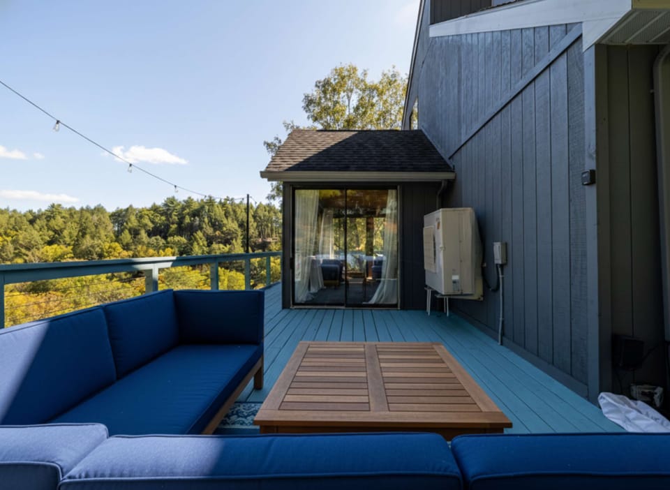 Pull out a chair at the outdoor dining table and eat in the open air — this deck was built for long dinners with good company.