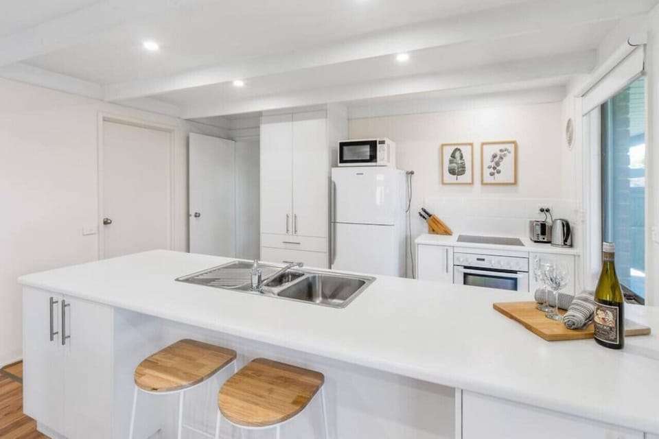 Fully equipped kitchen with dishwasher, microwave and all utensils required to cook for your family.
