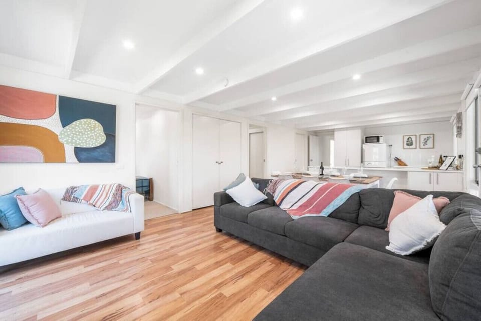 Spacious lounge with comfy furnishings.