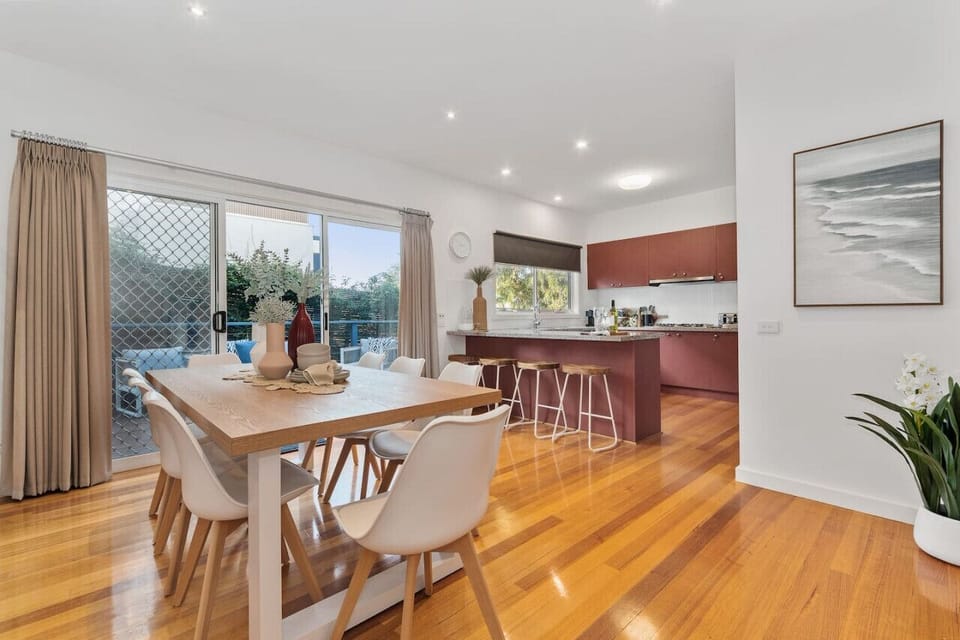 Dining room leads on into kitchen. To your right is a corridor with laundry, 2 more bedrooms and the main bathroom with separate toilet.