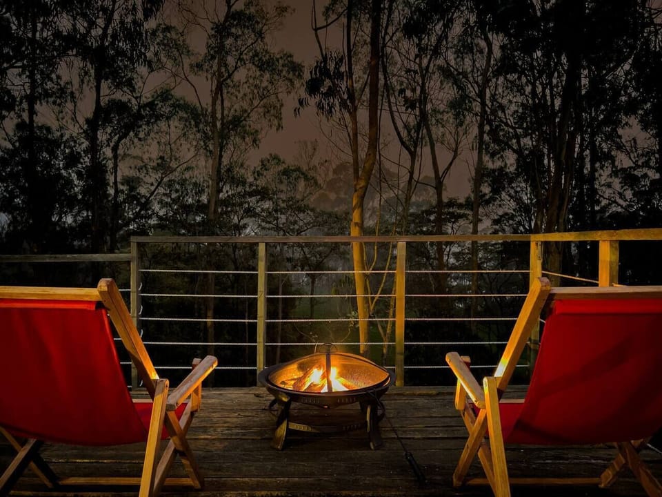 Sunset accompanied by a campfire on the deck of Hacienda Nebraska