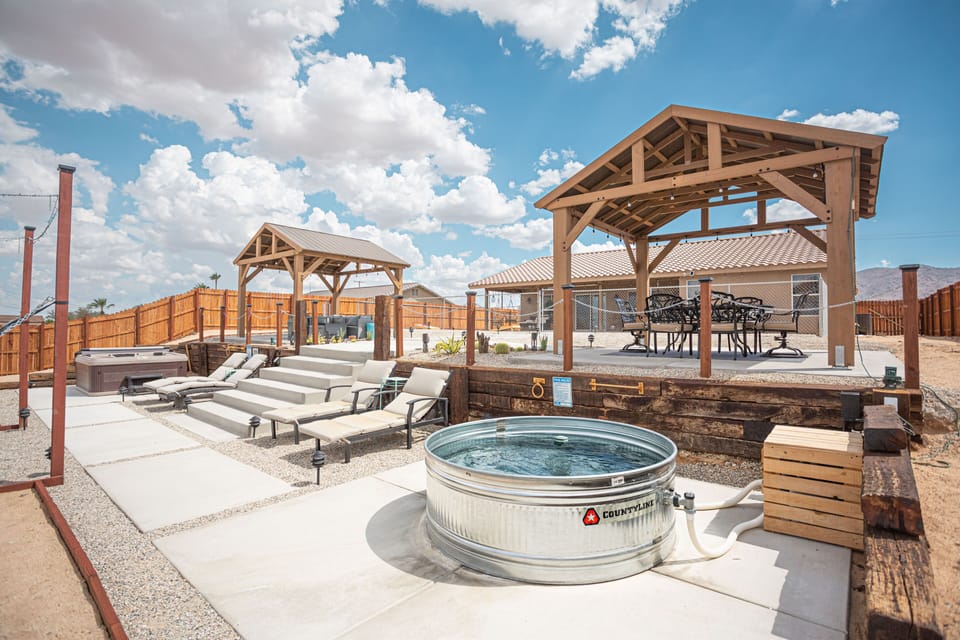 Take a refreshing dip in our cowboy-glam stock tank pool.