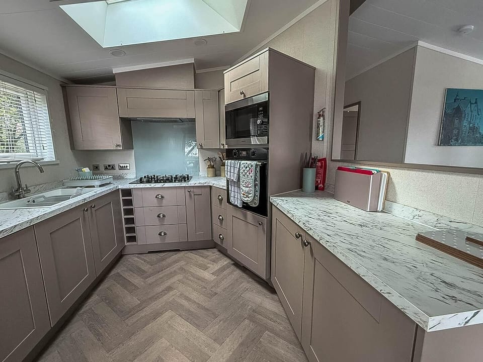 A lodge with a cosy kitchen is the ultimate retreat for a peaceful family holiday.