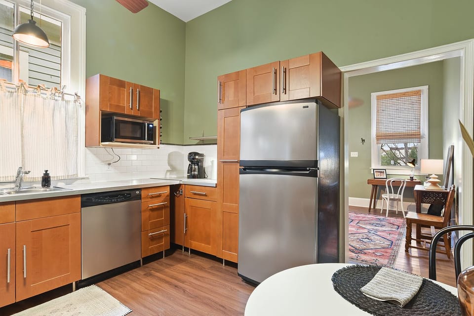 Fully equipped kitchen includes a bistro table and 2 chairs. 