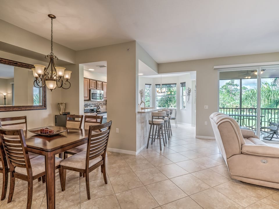 Open floor plan with view of golf course from the living area