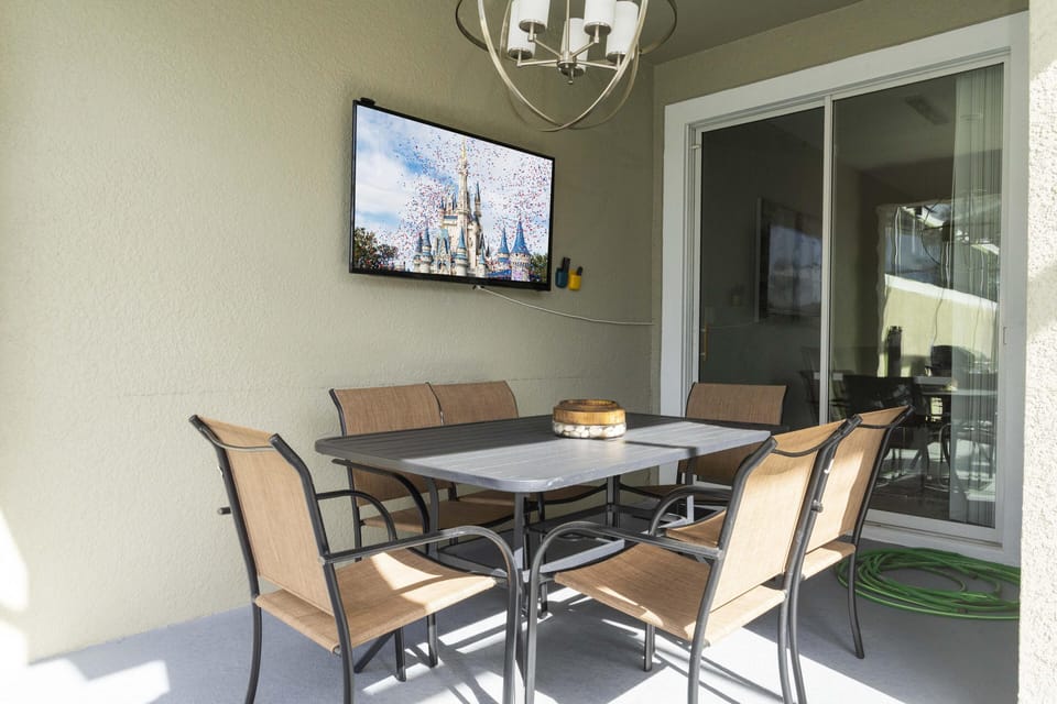 Outdoor TV and covered lanai.