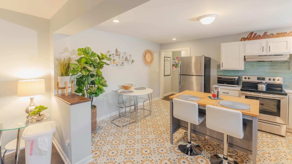 Hive kitchen showing island and table