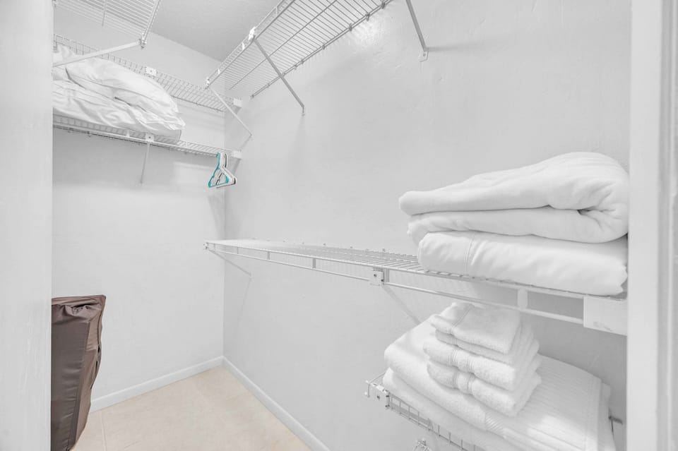 Walk in closet with extra linens