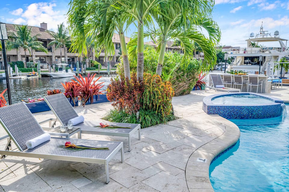 Relax pool side in one of the lounge chairs