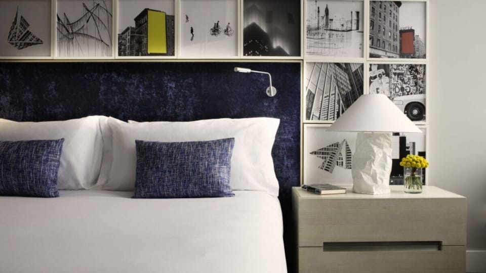 Sink into crisp linens and curated art for restful nights.
