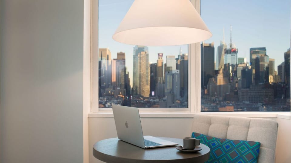 Catch up on emails with an inspiring skyline right outside.