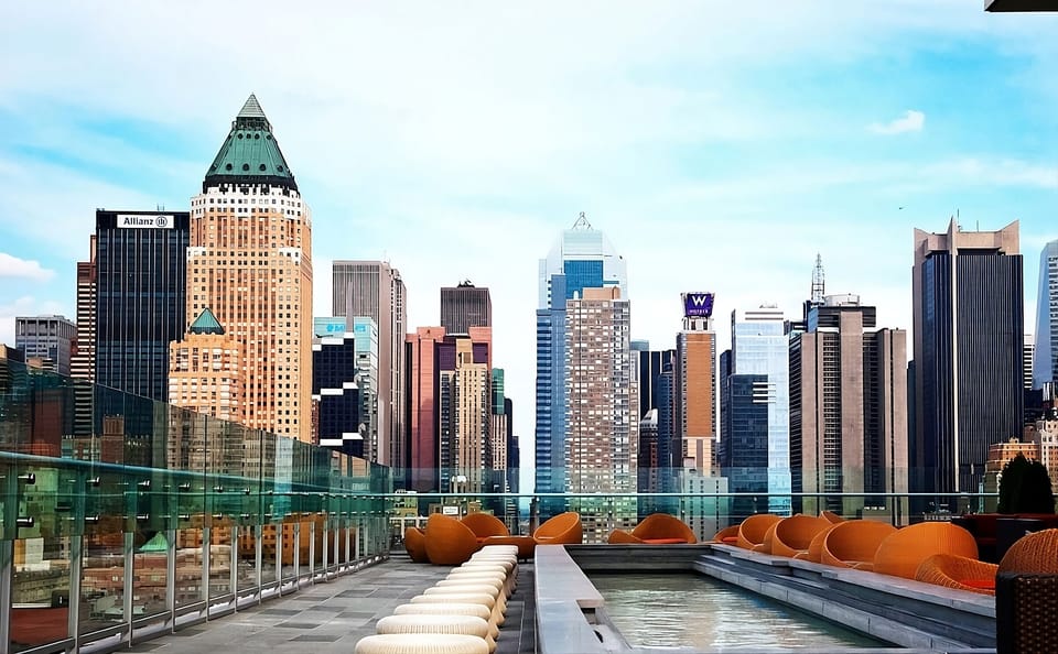 Soak in the rooftop pool with sweeping city panoramas.