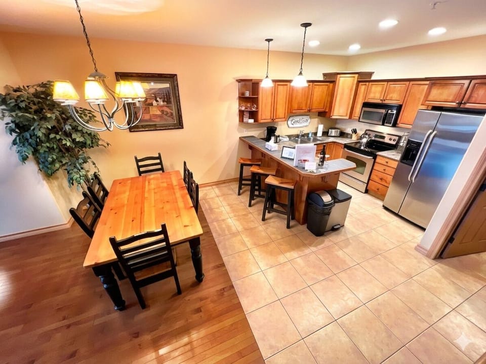 Dining table that seats 6, plus 3 spots at the bar. Fully stocked kitchen, with everything you'll need to feed the crew.