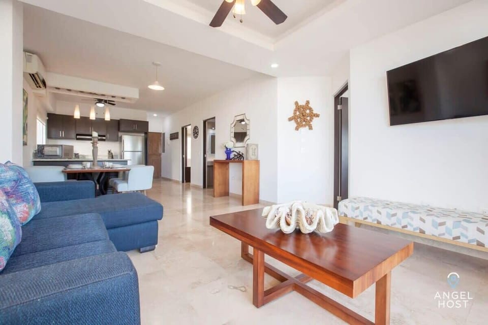 A wonderfully wide open LIVING AREA with lots of natural light