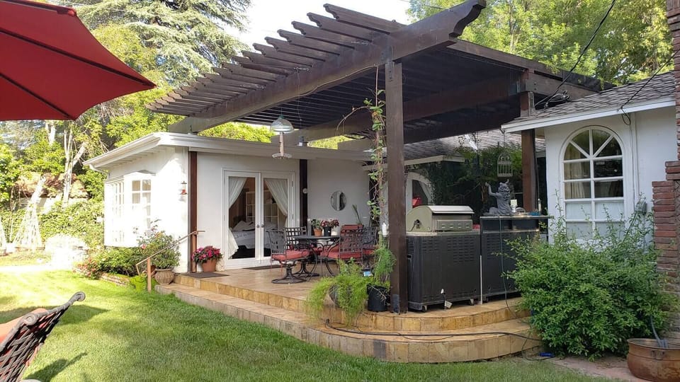 Studio with own French doors opening onto  shared stone patio with firepit,BBQ,