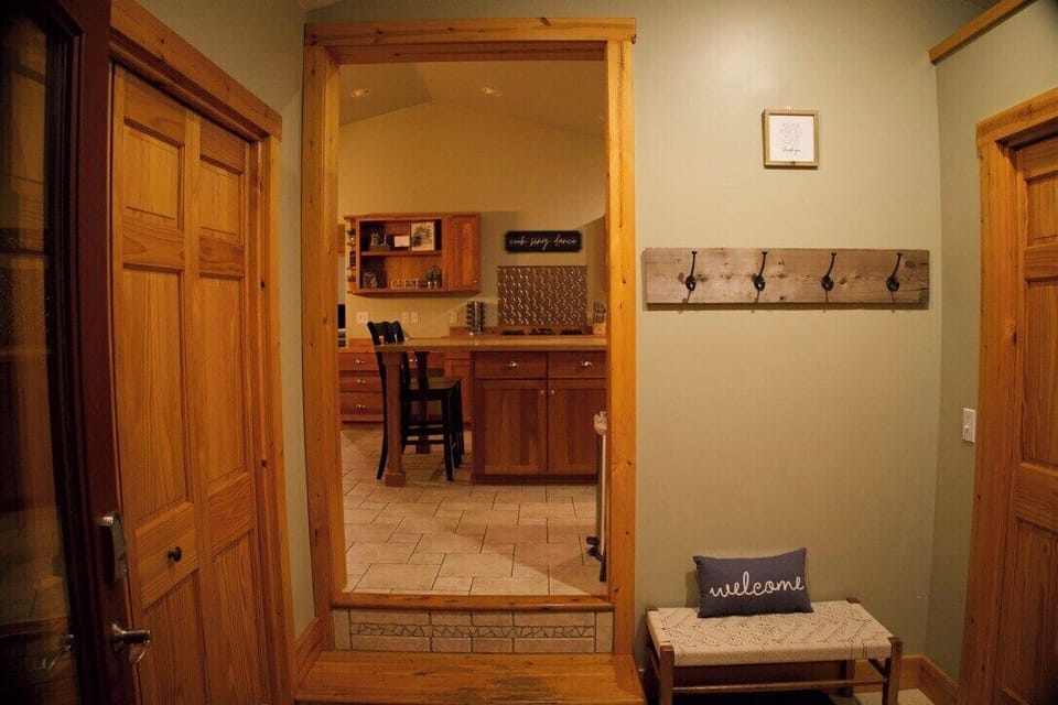 Welcome! Main floor entrance flows right into a spacious, open kitchen and dining area.