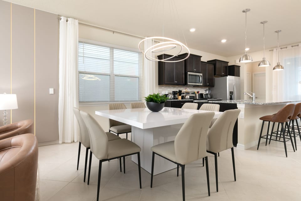 Open concept between living/dining room and kitchen.