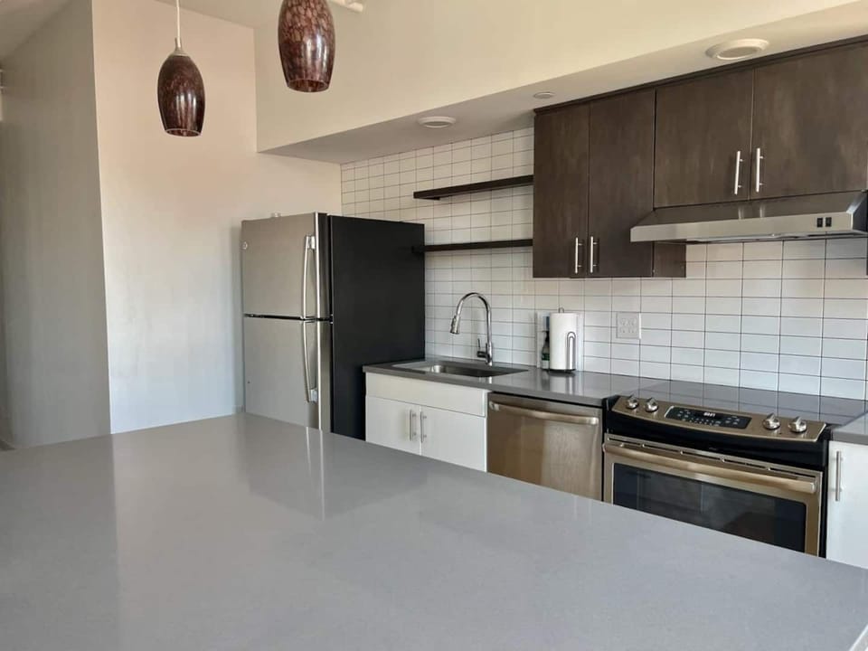 Fully equipped kitchen with stainless steel appliances