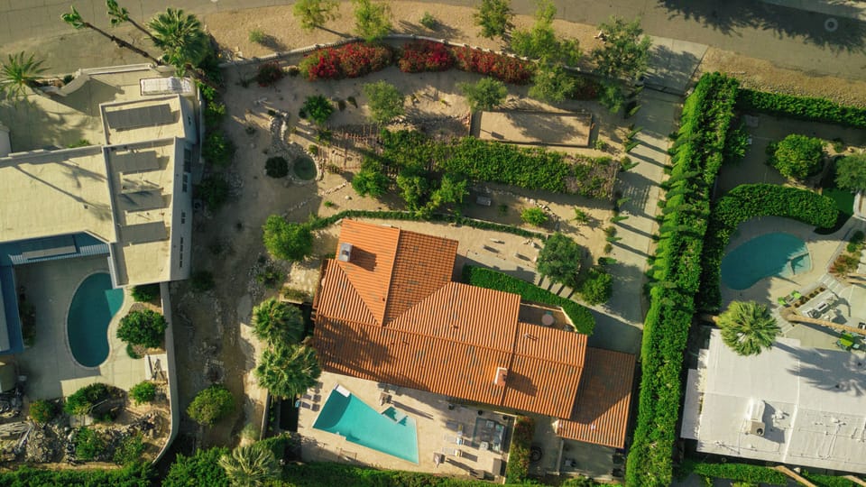 Aerial view of half acre property.