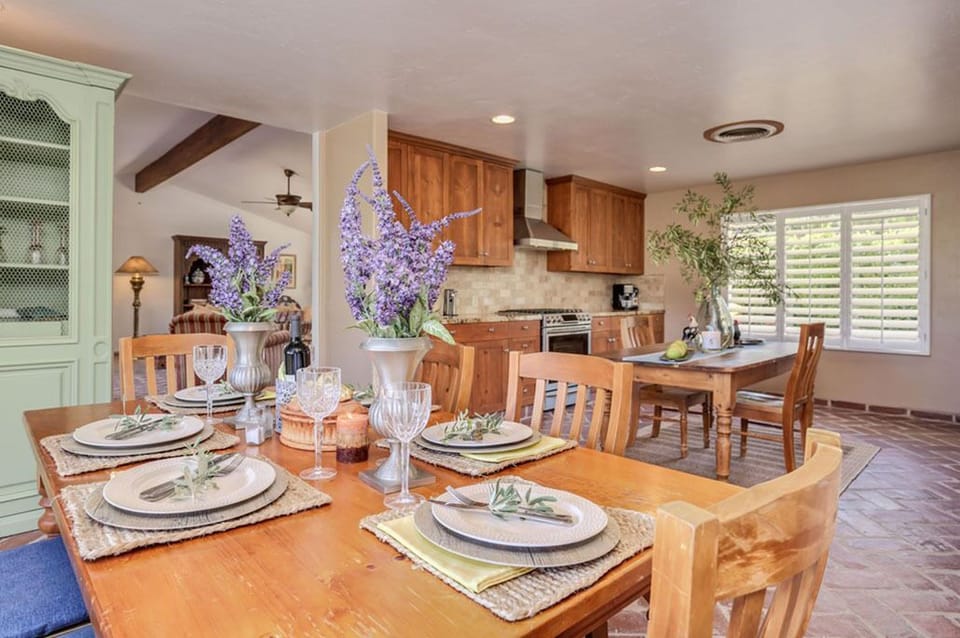 The dining room table can comfortably set 6 people.  