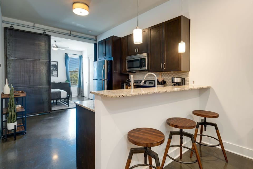 Fully equipped kitchen with stainless steel appliances