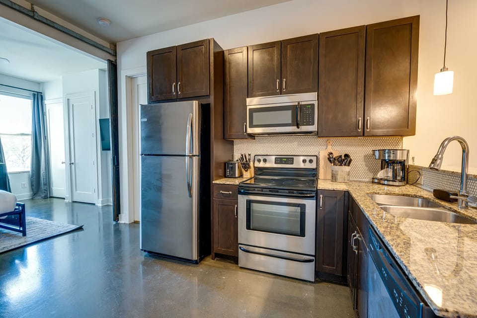 Fully equipped kitchen with stainless steel appliances