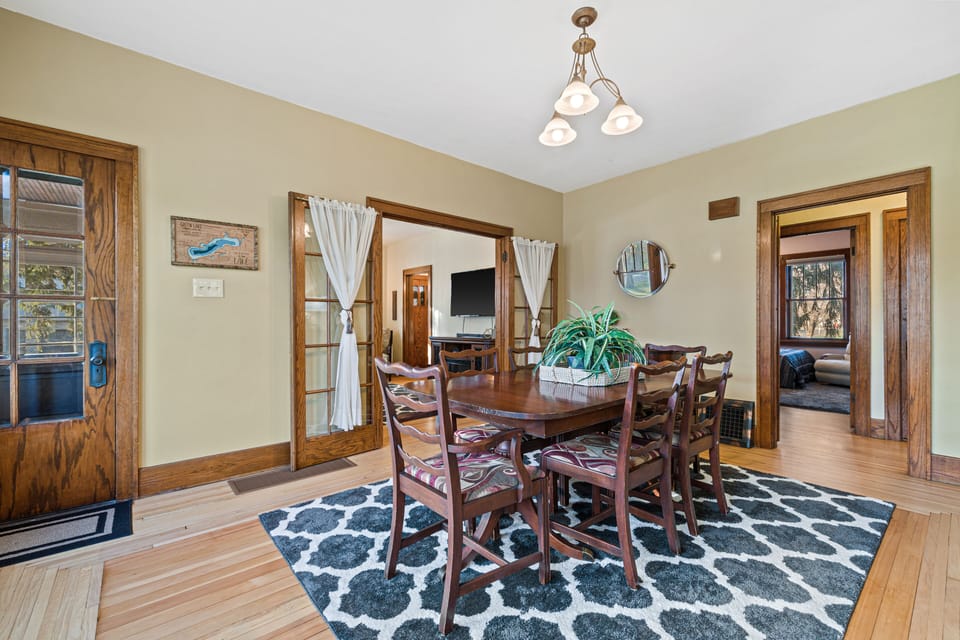 Dining room with natural lighting that connects to living room for entertaining.
