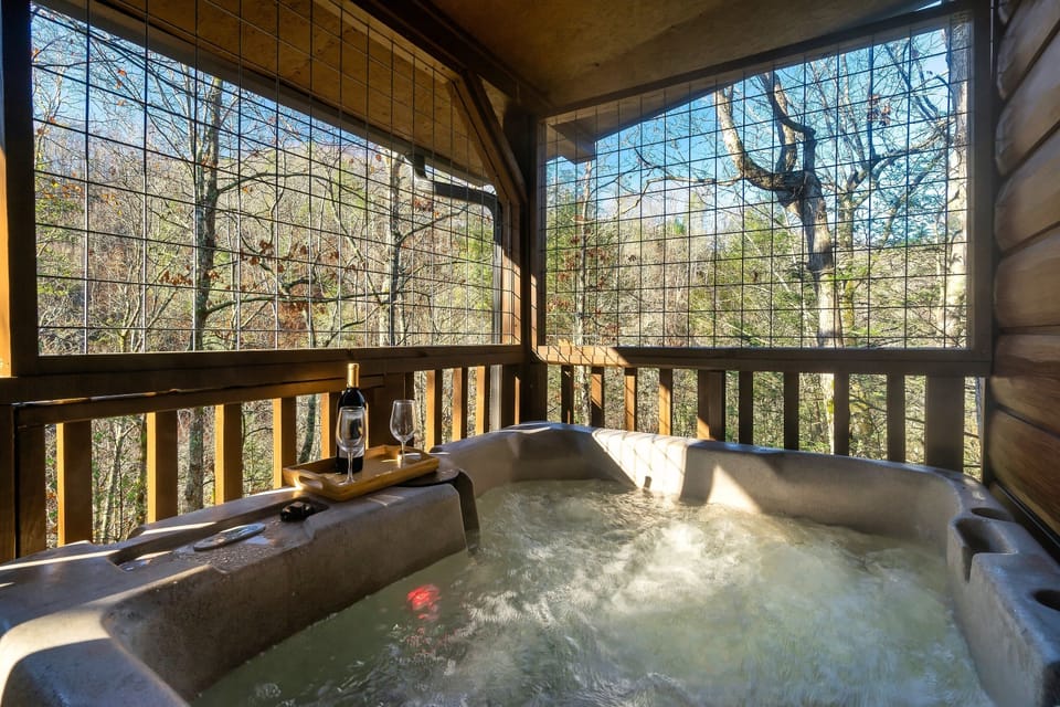 Feels like your own woods retreat with a hot tub on the porch