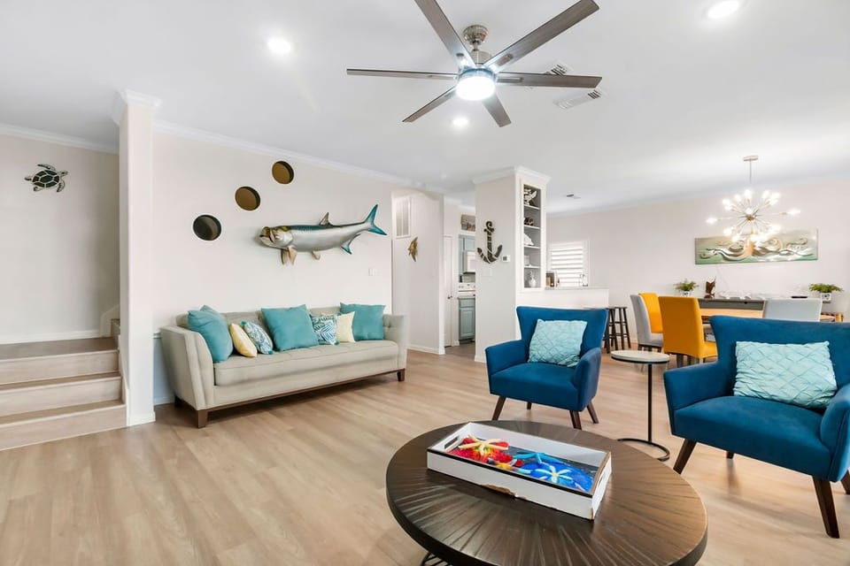 Beautiful, spacious living room with plenty of comfortable seating. 