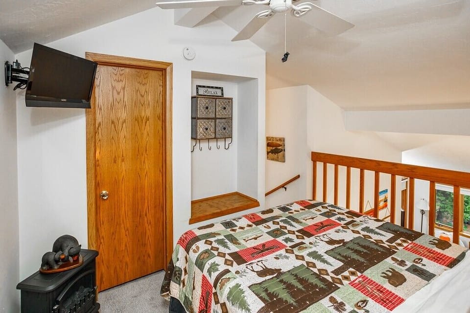 Bedroom #2 (upper level)- includes a Queen size bed, TV, ceiling fan, and extra blankets *The loft is not enclosed