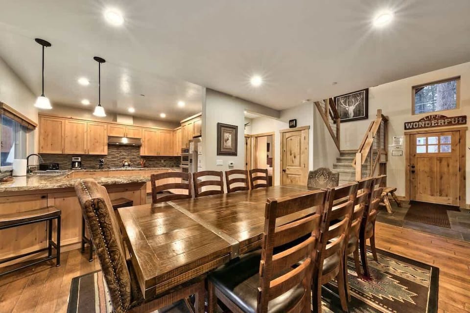 Seating or 12 between the breakfast bar and the large dining table. 
