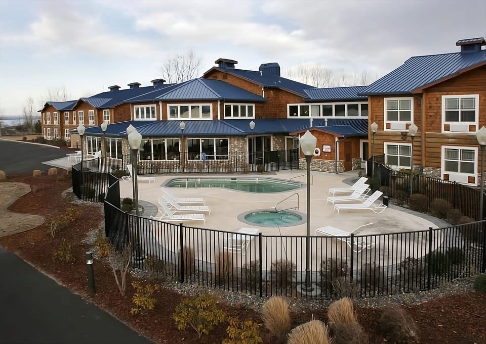 Unwind poolside with spacious decking and easy conversation areas.