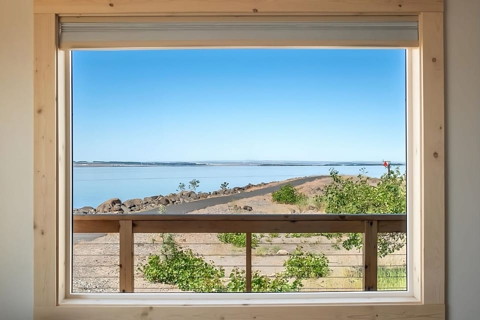 Soak in serene waterfront views from your private perch.