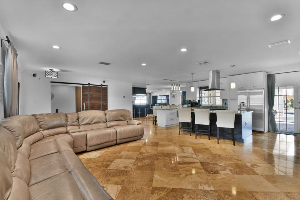 Lounge is open plan, large L-Sofa, TV, and plenty of space