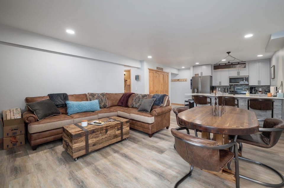 Sink into this spacious leather sectional after your adventures, with a fully equipped kitchen ready for your culinary creations.