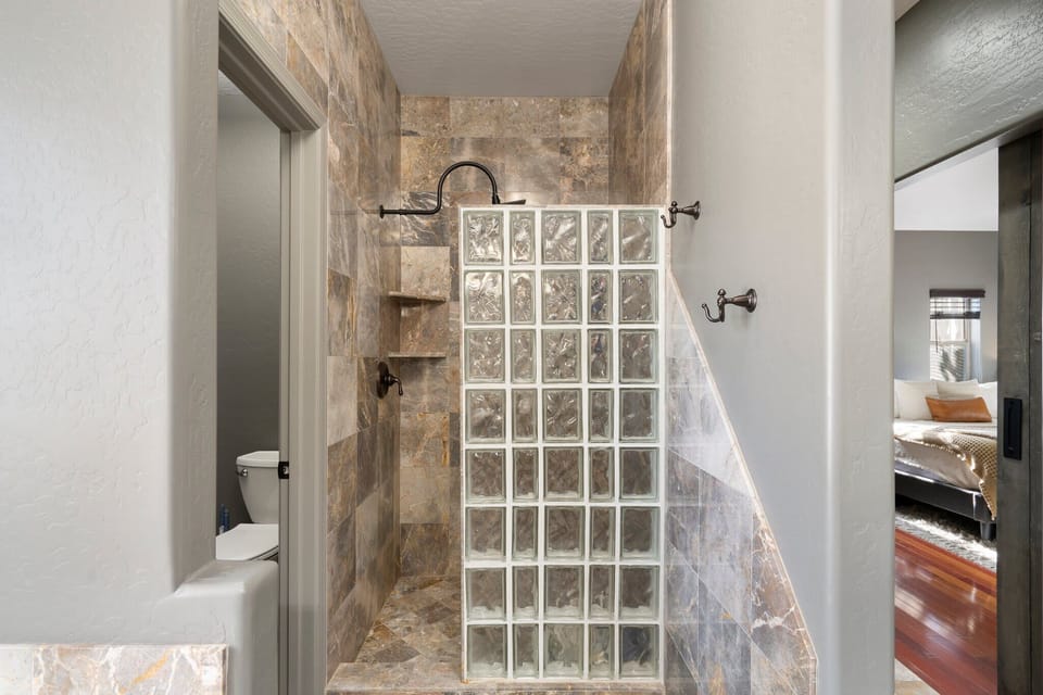 Private ensuite bathroom, tiled walk in shower, soaking bathtub, double sinks