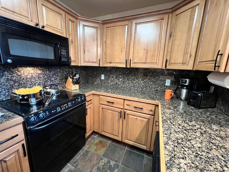 Stove, Microwave, Refrigerator and Dishwasher