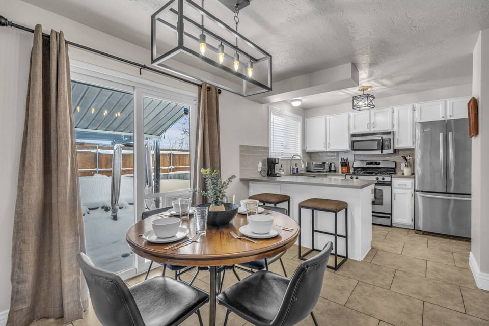 Seating for 4 at the Dining Table and 2 at the Bar allows your Family to Gather Together for their Hot Meals
