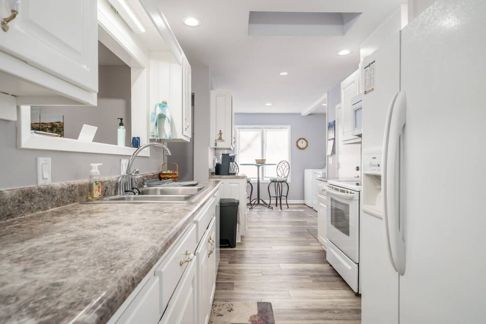 Looking down the Galley Style Kitchen