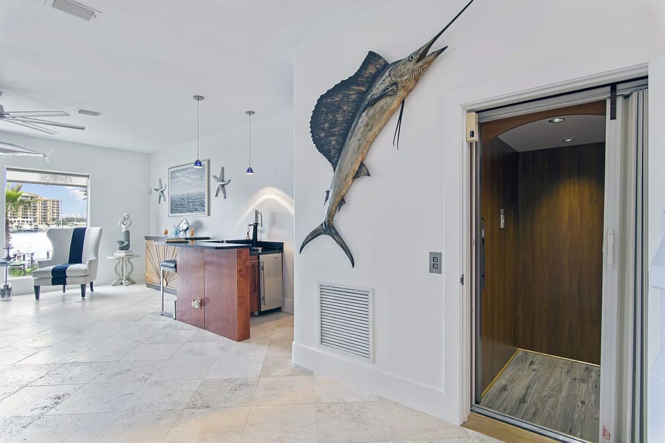 Entry hallway featuring coastal décor & a touch of nautical charm