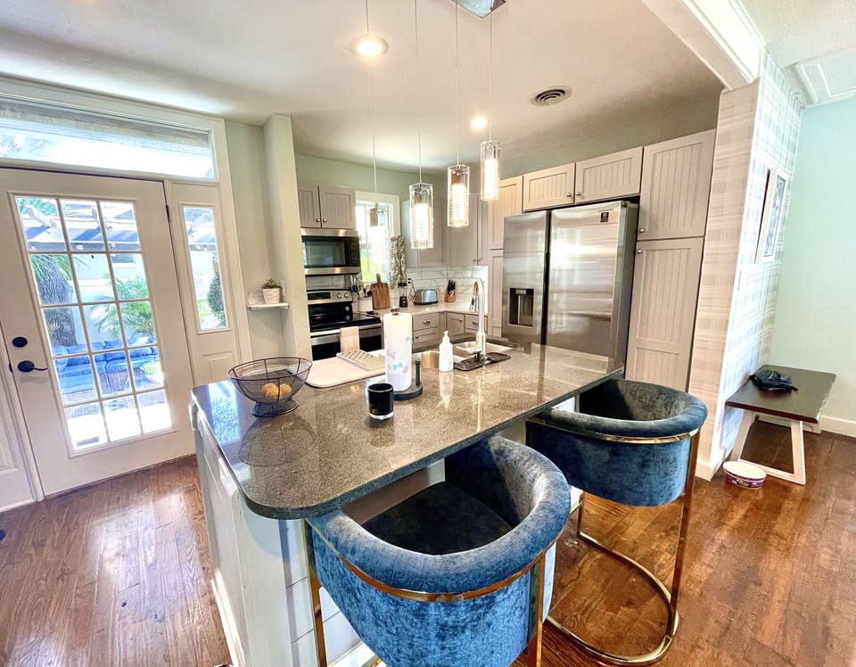 Kitchen island with double sink and garbage disposal