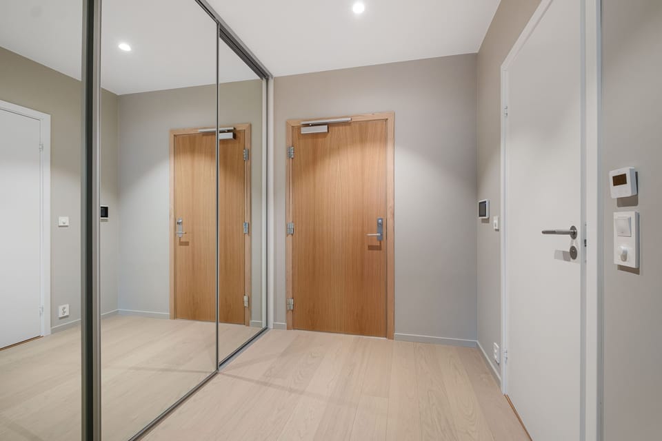 spacious wardrobe with mirrors in the hall
